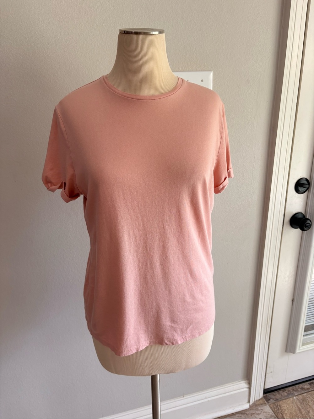 A. New Day light pink short cuffed sleeve tshirt in size small GUC